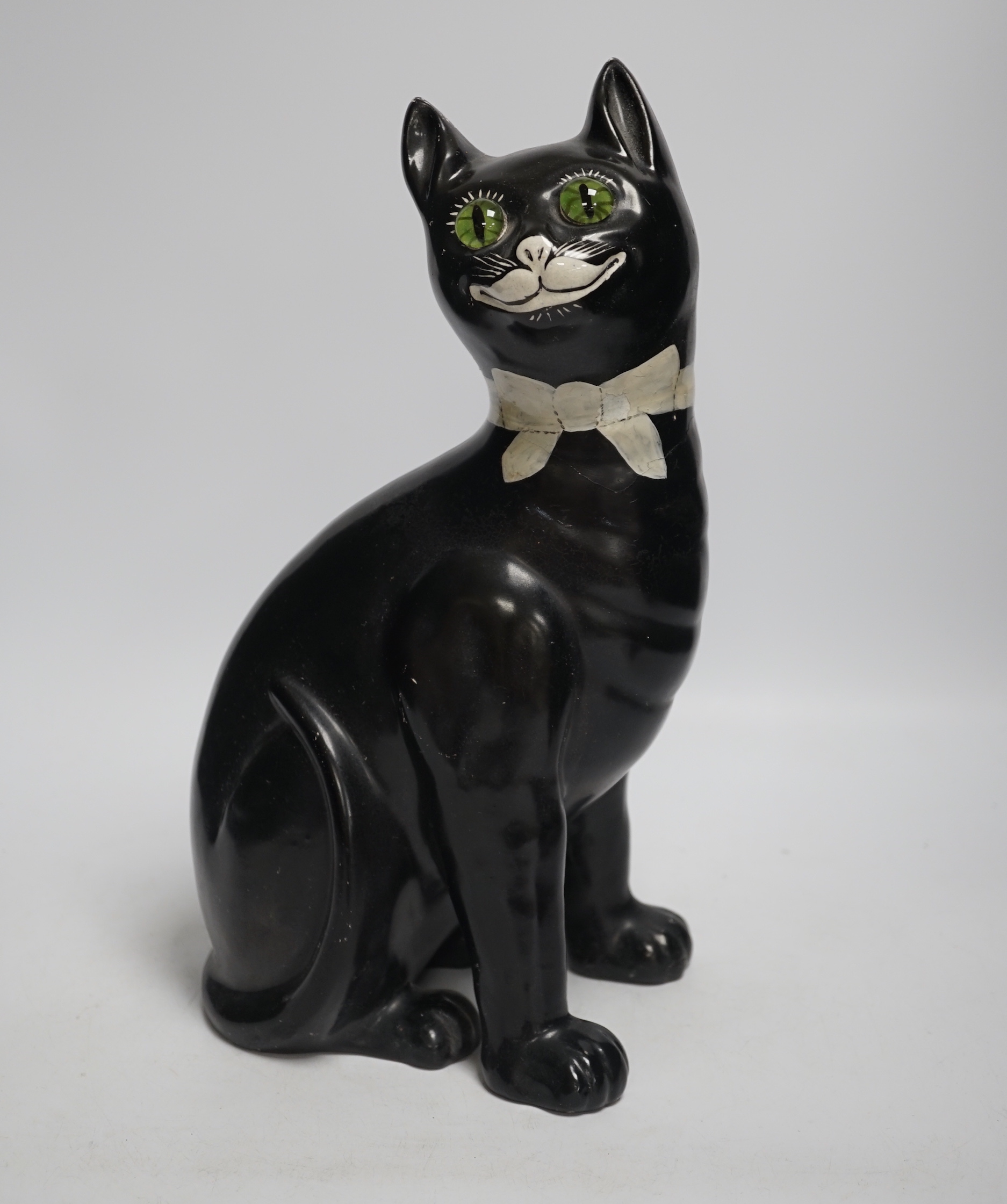 A Gallé style black glazed model cat with glass eyes, possibly Mosanic, 33cm high